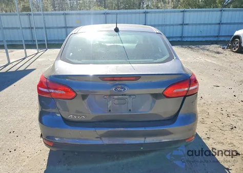 2015 Ford Focus S z USA, uszkodzony, nr VIN 1FADP3E2XFL251548